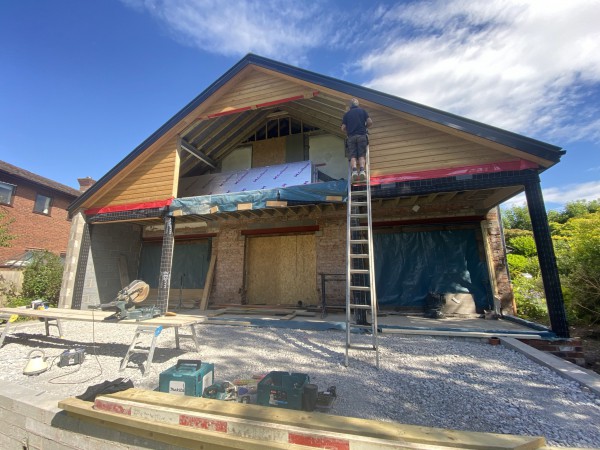 Upper story cladding